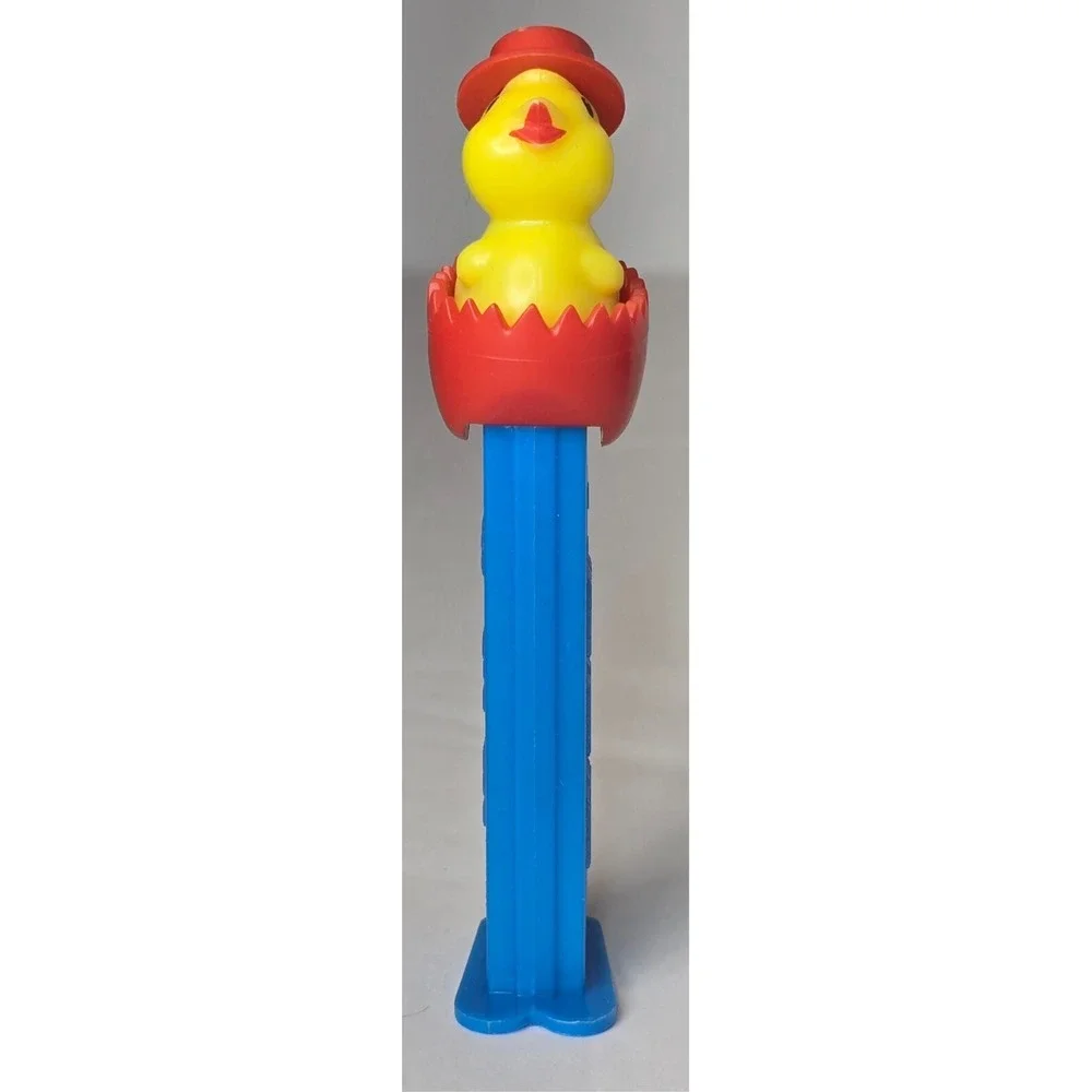 VINTAGE PEZ BABY CHICK CRACKED EGG RED TOP HAT DISPENSER W/ FEET COLLECTIBLE EUC